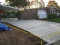 Standard grey concrete driveway with broomed finish