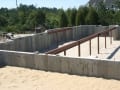 Concrete foundation with curved walls