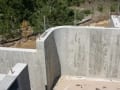 Concrete foundation with curved walls